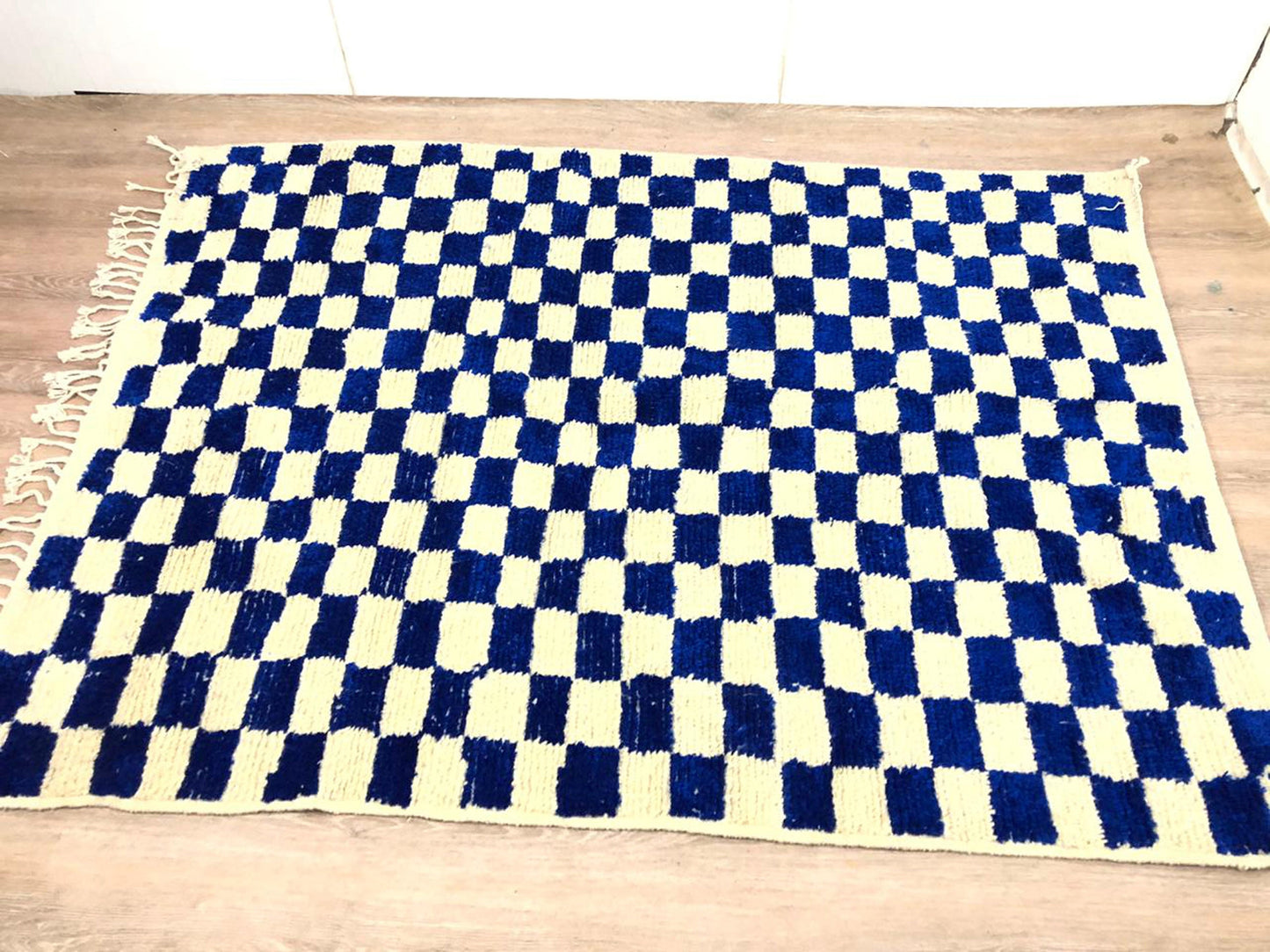 Handmade Moroccan Berber wool blue and white checkered rug.