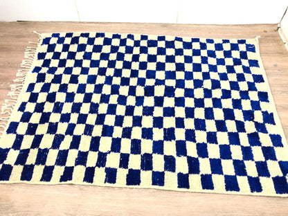 Handmade Moroccan Berber wool blue and white checkered rug.