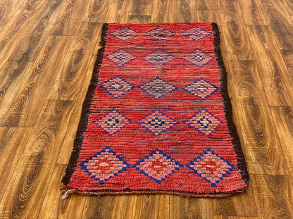 2x5 ft Moroccan small woven area rug.