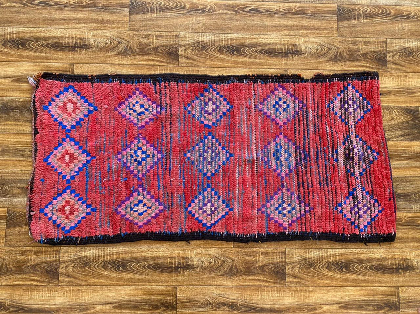 2x5 ft Moroccan small woven area rug.