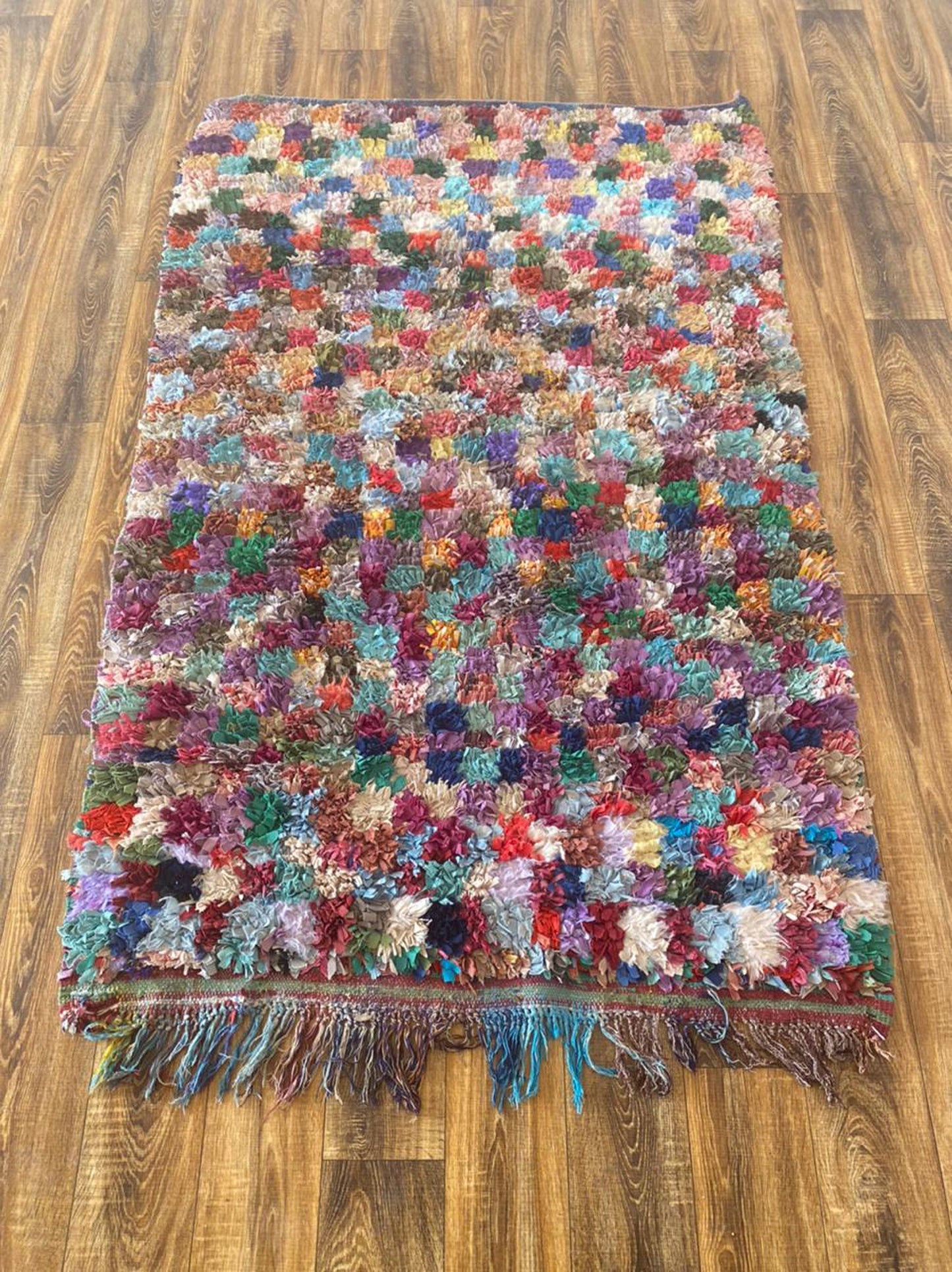 4x6 ft Moroccan Boucherouite area rug.