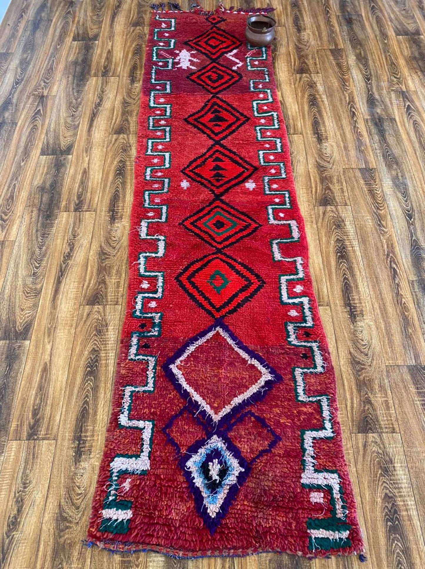 2x10 ft colorful narrow Moroccan runner rug.