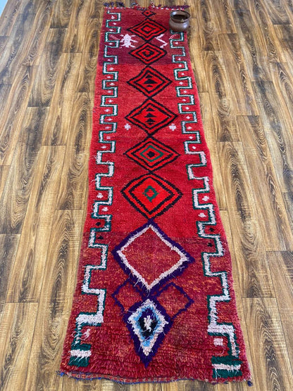 2x10 ft colorful narrow Moroccan runner rug.