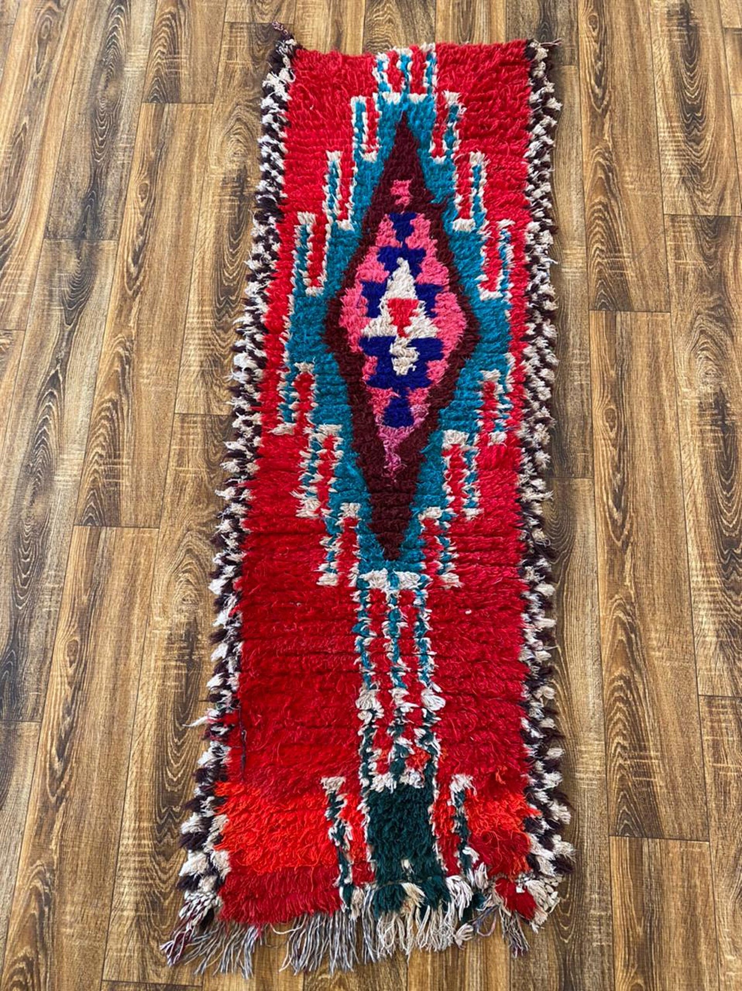 2x6 ft colorful small Moroccan runner rug.