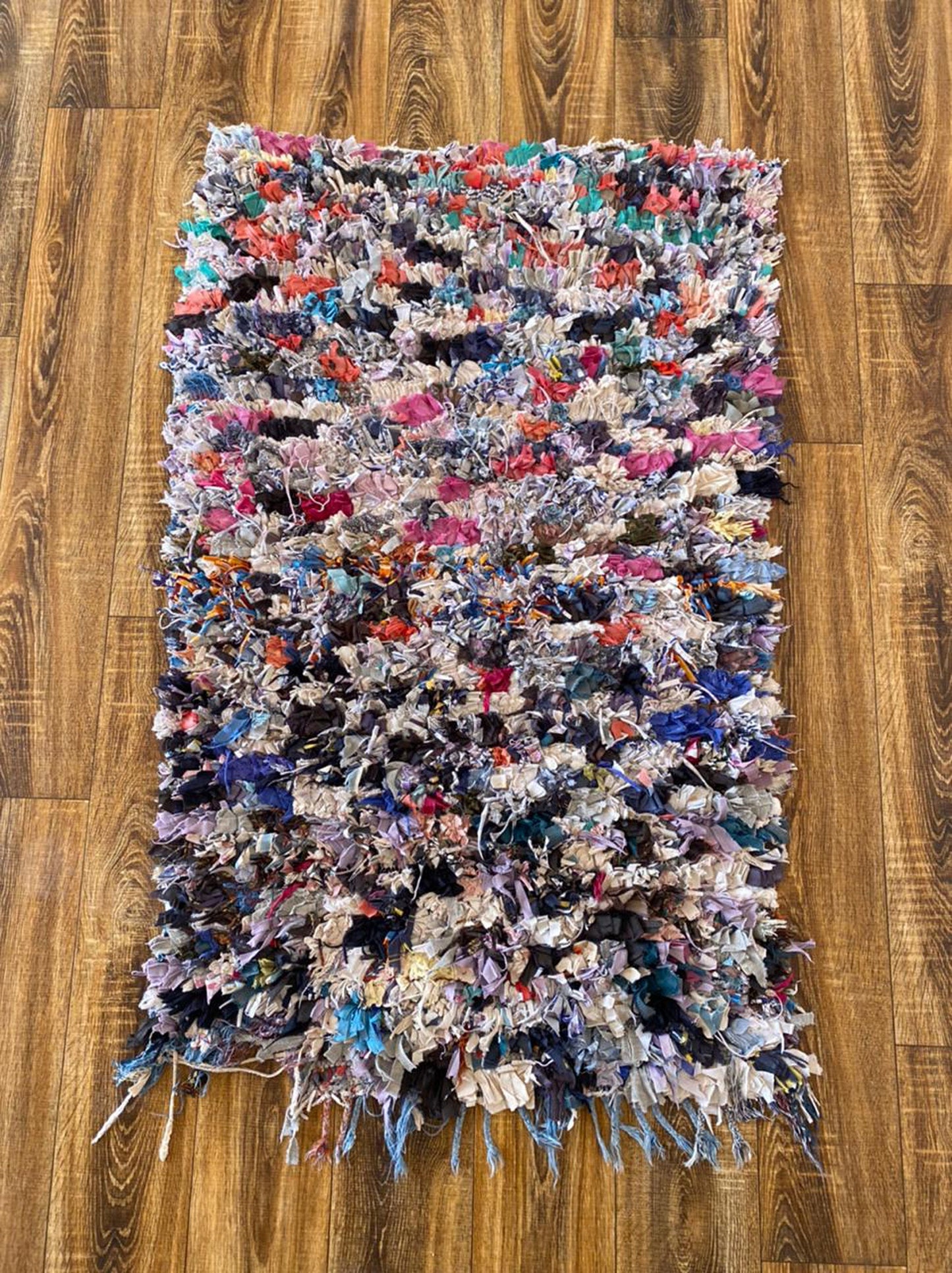 3x4 ft small boucherouite Moroccan rug.