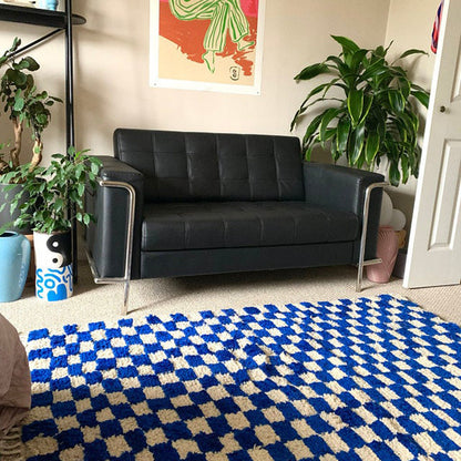 Handmade Moroccan Berber wool blue and white checkered rug.