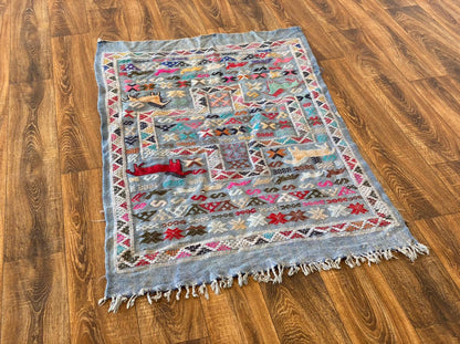 3x5 ft colorful small Moroccan kilim rug.