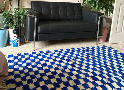 Handmade Moroccan Berber wool blue and white checkered rug.