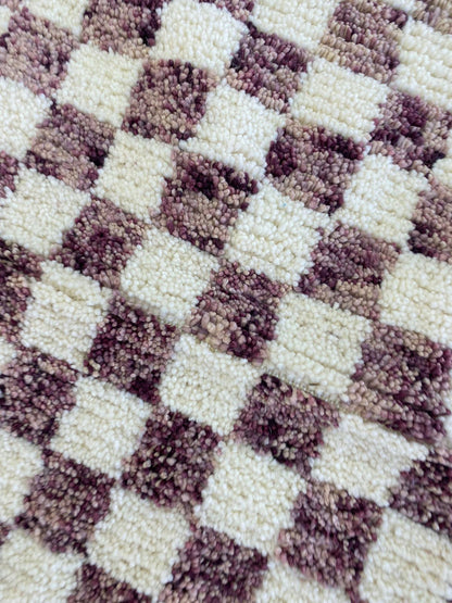 Checkered Purple area rug.