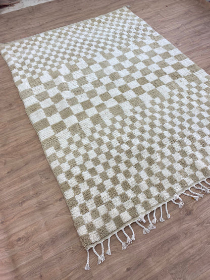 Checkered Beige and white area rug.