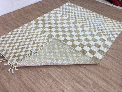 Checkered Beige and white area rug.