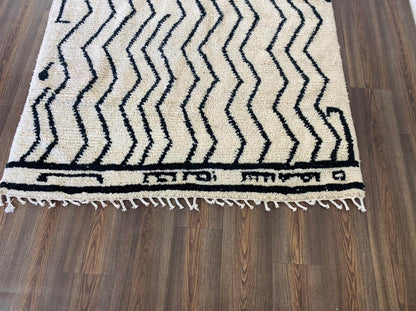 Handmade Moroccan cutsom rug, Berber beni ourain black and off-white area rug.