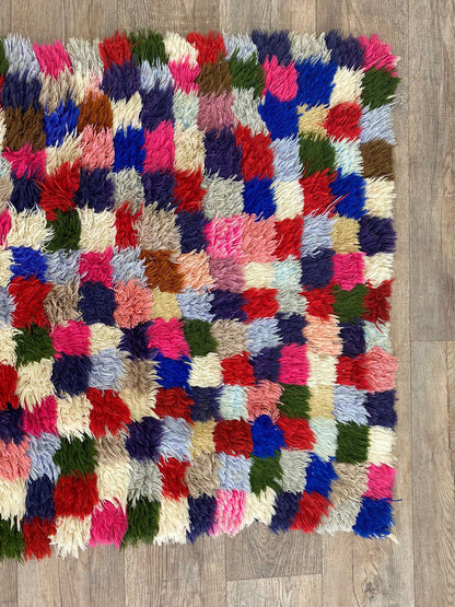 3x7 FT woven colorful Moroccan runner rug.