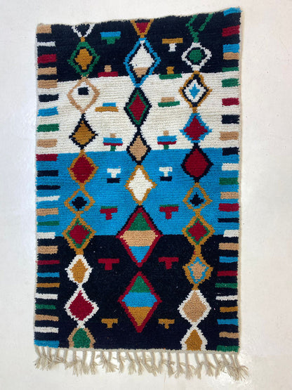 Tapis berbère marocain tissé à la main, tapis en laine coloré personnalisé.